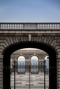 Gate below historic bridge