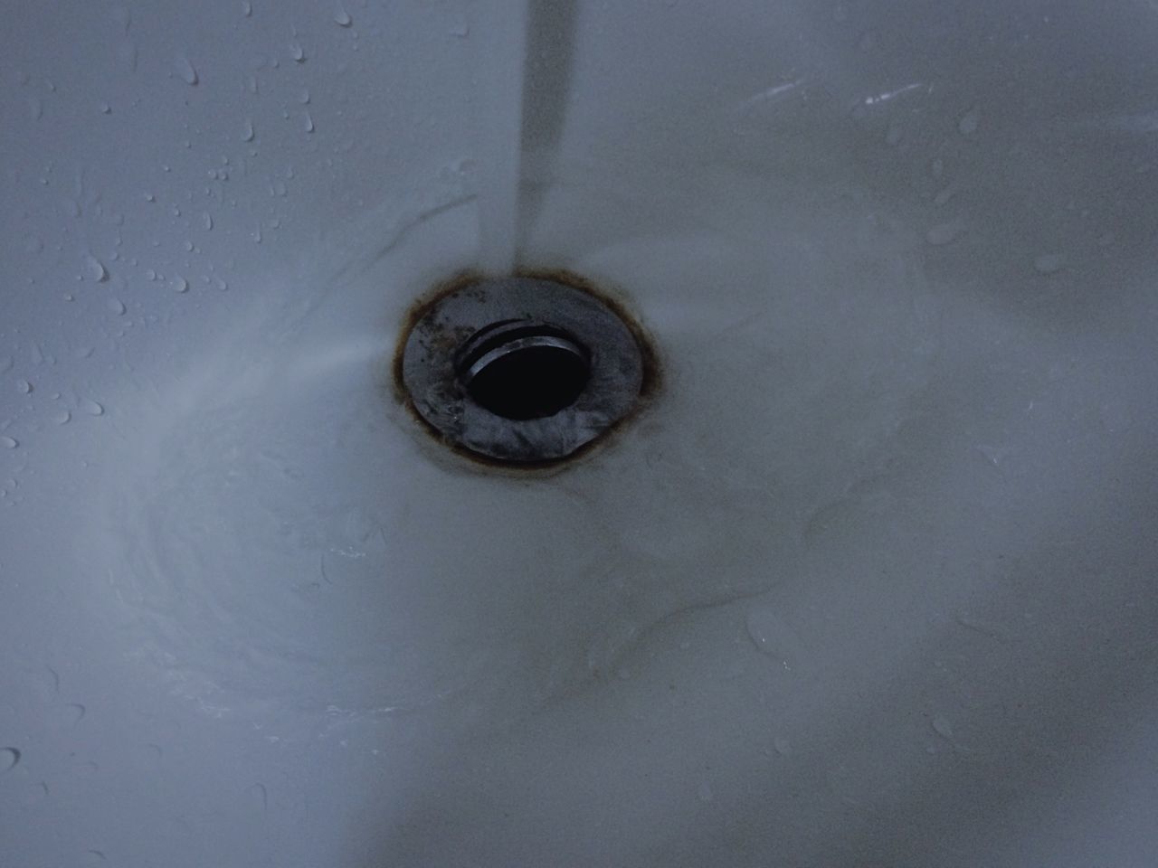 indoors, close-up, full frame, backgrounds, circle, metal, no people, built structure, textured, pattern, hole, metallic, wall - building feature, water, day, detail, reflection, ceiling, simplicity, white color