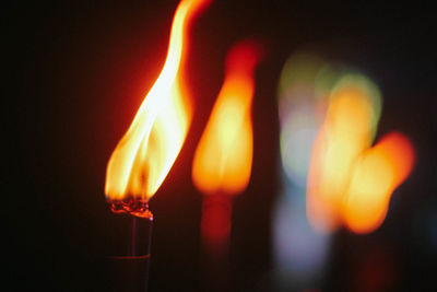 Close-up of lit candles