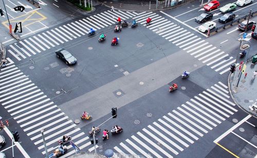 High angle view of scooters on road