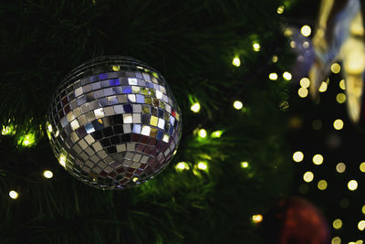 Close-up of illuminated christmas tree at night