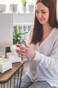 Young woman using mobile phone