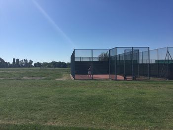 View of field against clear sky