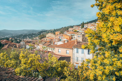 View of townscape against sky during autumn