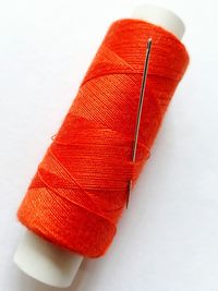 Close-up of red over white background