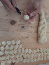 High angle view of person preparing food on table