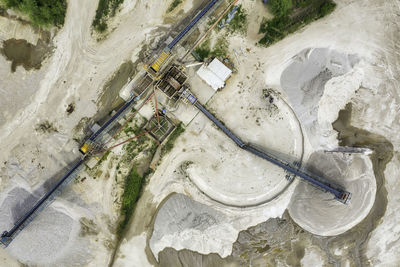 High angle view of umbrella on road