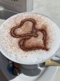 High angle view of coffee cup on table