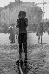 Woman standing in park