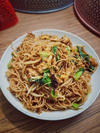 High angle view of noodles served in plate on table