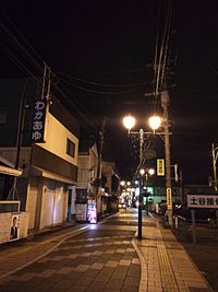 Illuminated street light at night