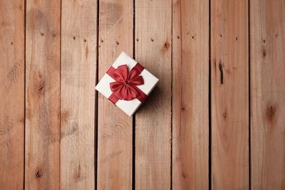 Directly above shot of umbrella on wooden box