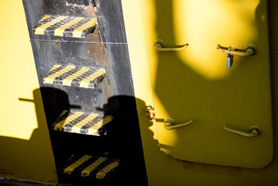 Close-up of yellow door