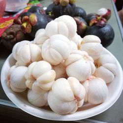 High angle view of fruits in plate on table