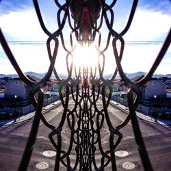 Close-up of metal structure against sky