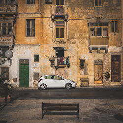 Car outside residential building