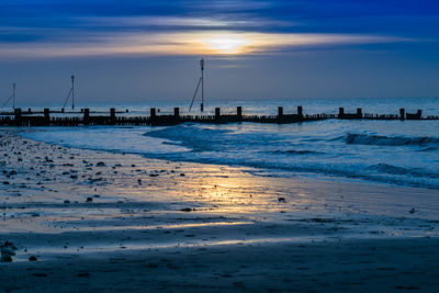 Scenic view of beach during sunset