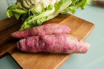 High angle view of vegetables on cutting board