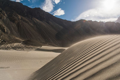 Scenic view of desert against sky