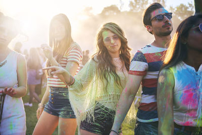 Friends enjoying dancing at carnival