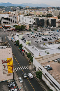 High angle view of street amidst buildings in city