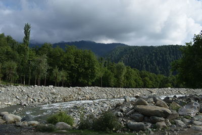 Scenic view of rocky mountains against sky