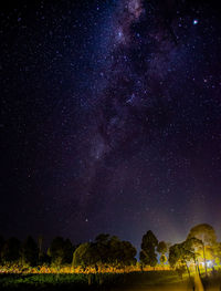 Scenic view of star field against sky at night