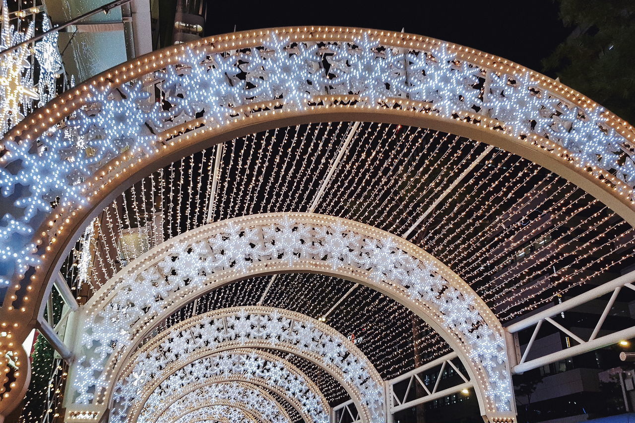 HIGH ANGLE VIEW OF SPIRAL STAIRCASE IN CORRIDOR