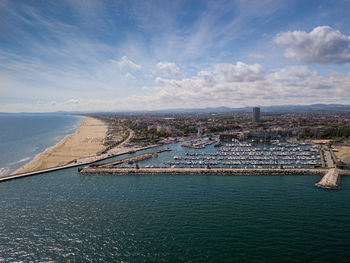 Panoramic view of rimini, its sea, its beaches and its port on the romagna riviera in post-pandemic 