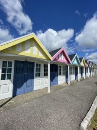 Low angle view of colorful houses against sky