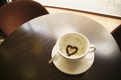 High angle view of coffee on table