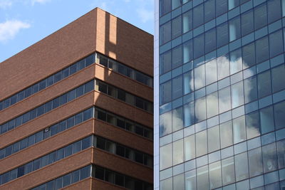 Low angle view of modern building against sky