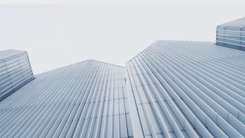 Low angle view of modern buildings against clear sky