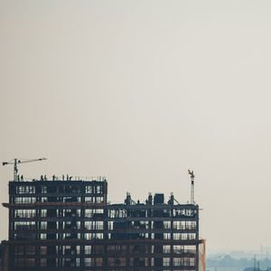 Low angle view of buildings against clear sky