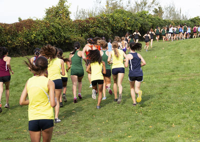Group of people playing on field