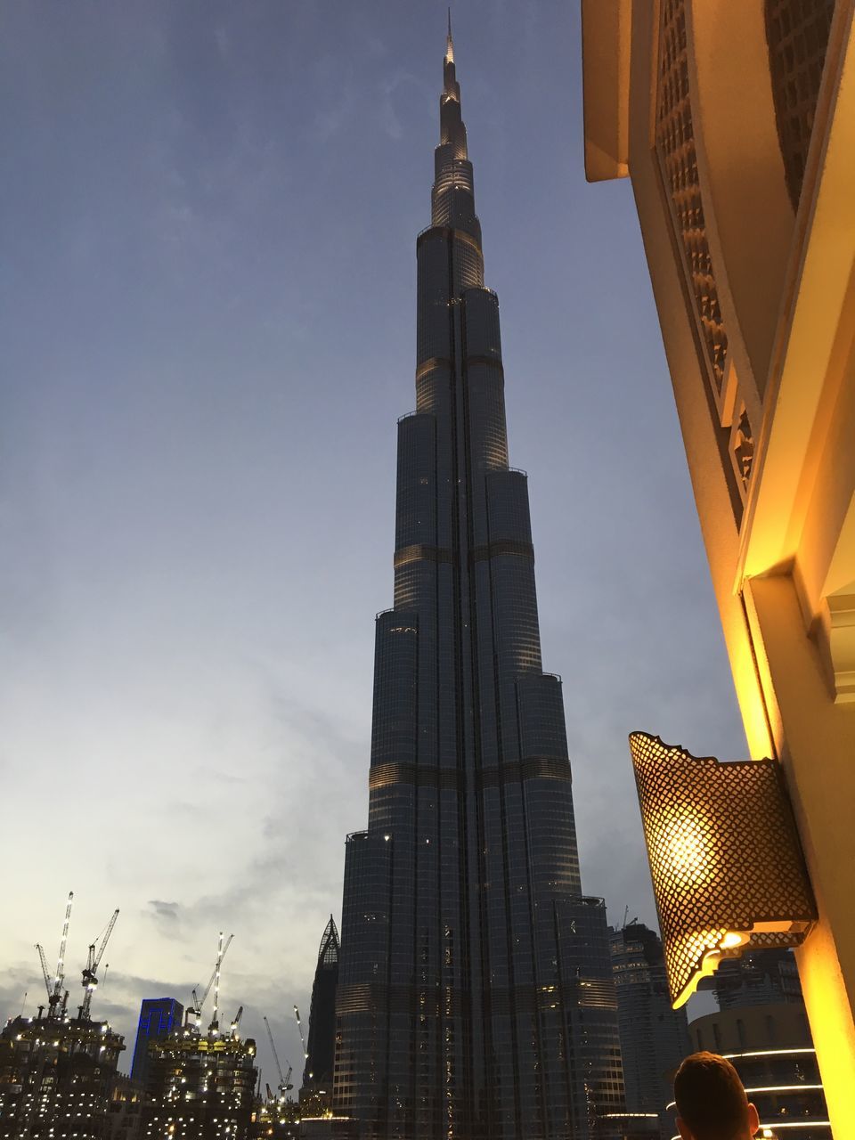 built structure, architecture, building exterior, sky, low angle view, city, building, skyscraper, office building exterior, tall - high, nature, tower, modern, no people, illuminated, travel destinations, office, tourism, dusk, outdoors, financial district, spire