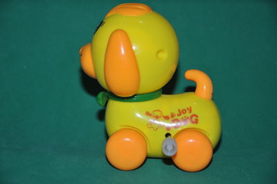 Close-up of yellow toys on table