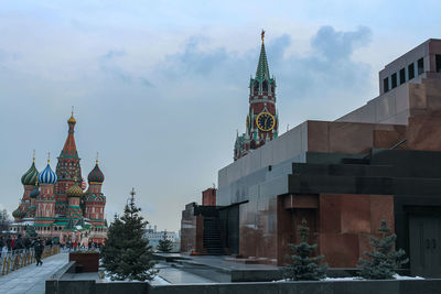 View of buildings in city against sky