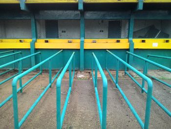 Turquoise railings at ticket counter