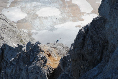 Panoramic view of man and rock formations