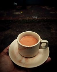 Close-up of coffee cup on table