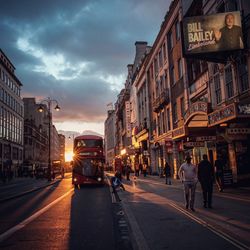 City street against cloudy sky