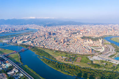 High angle view of river amidst buildings in city