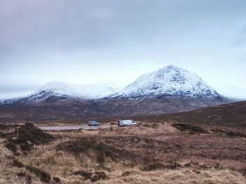 Cold winter day on meadow at river coupall at delta to river etive near glencoe. scottish highlands