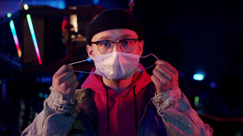 Portrait of young man wearing eyeglasses