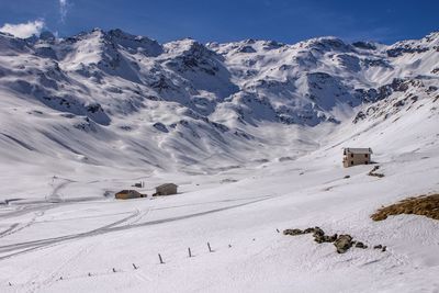 Scenic view of snow covered mountains