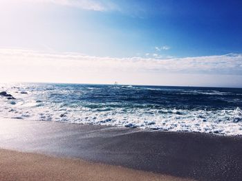 View of calm blue sea against sky