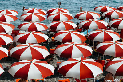 High angle view of red parasol at beach