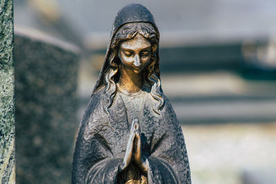 Close-up of statue against blurred background