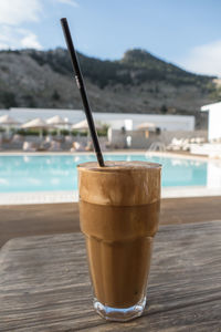 Close-up of coffee in glass on table